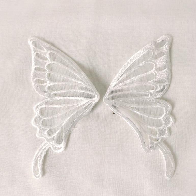 Large white butterfly hair accessory by LolitaFetch, featuring elegant milky white design and decorative butterfly shape for hairstyles.