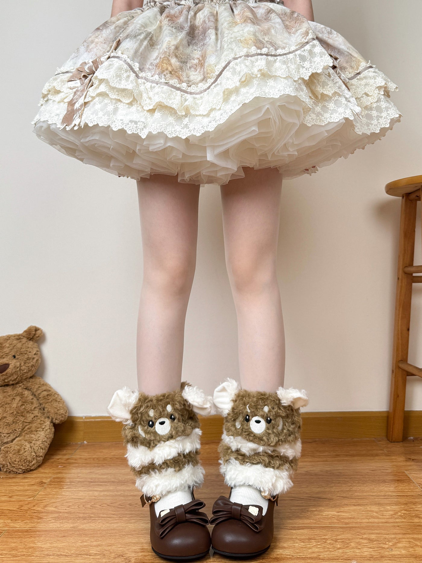 White face plush leg warmer with four-eyed puppy motif