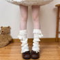 Ancienne version poignets de chaussettes à pompon retroussés