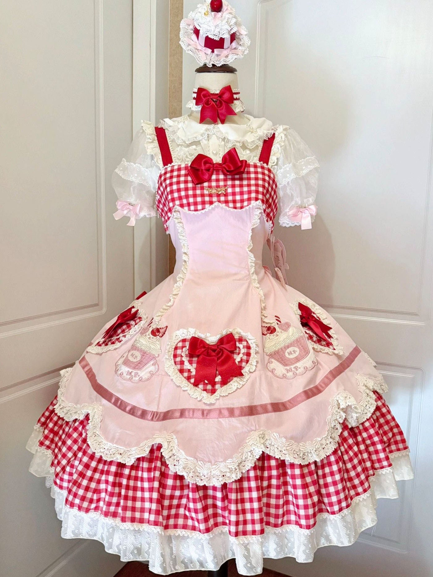 Pink Sweet Lolita dress with optional matching cape accessory