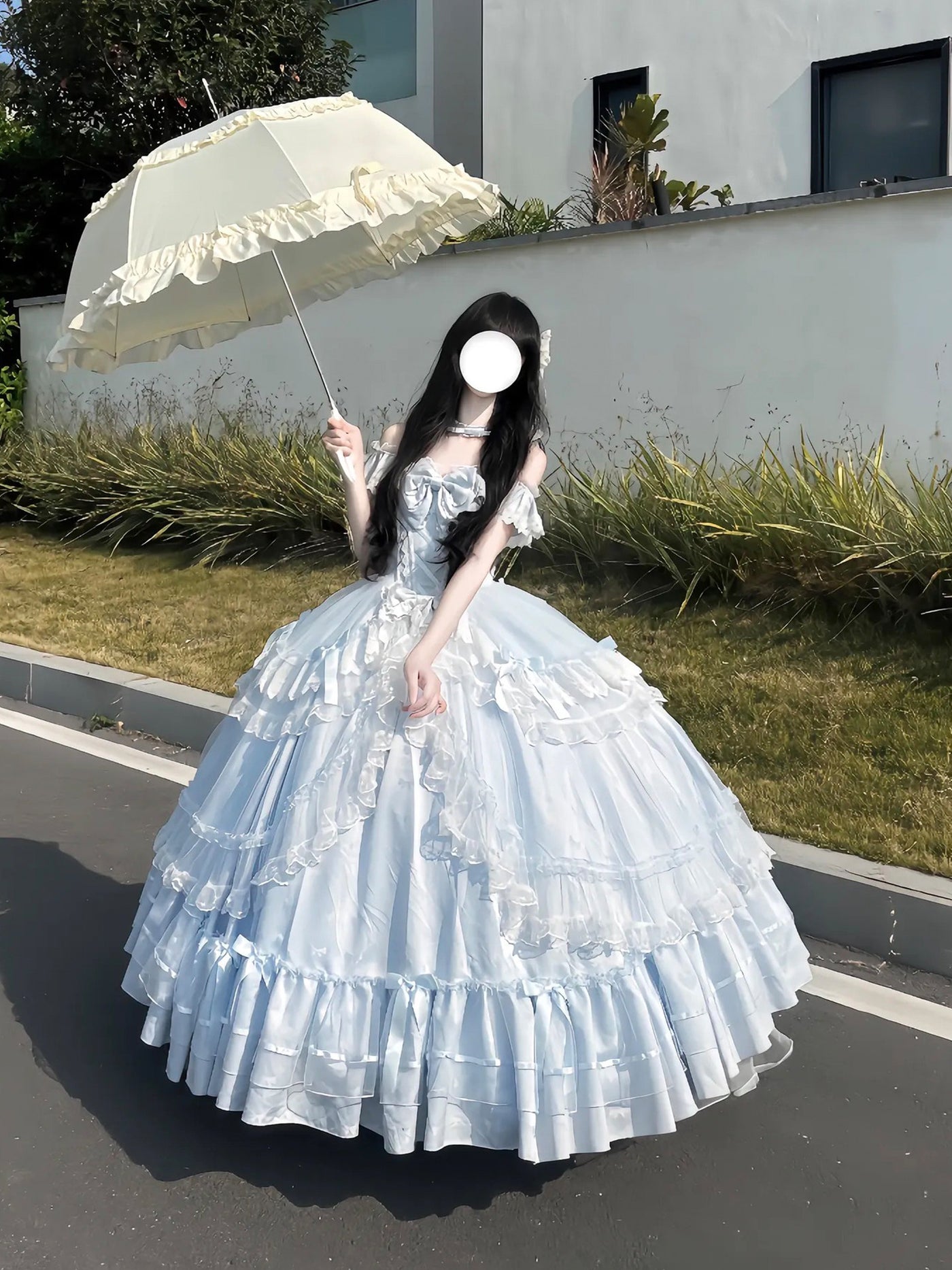 Pale blue Sweet Lolita formal gown with off-shoulder neckline and tiered ruffled skirt, paired with a matching skirt support