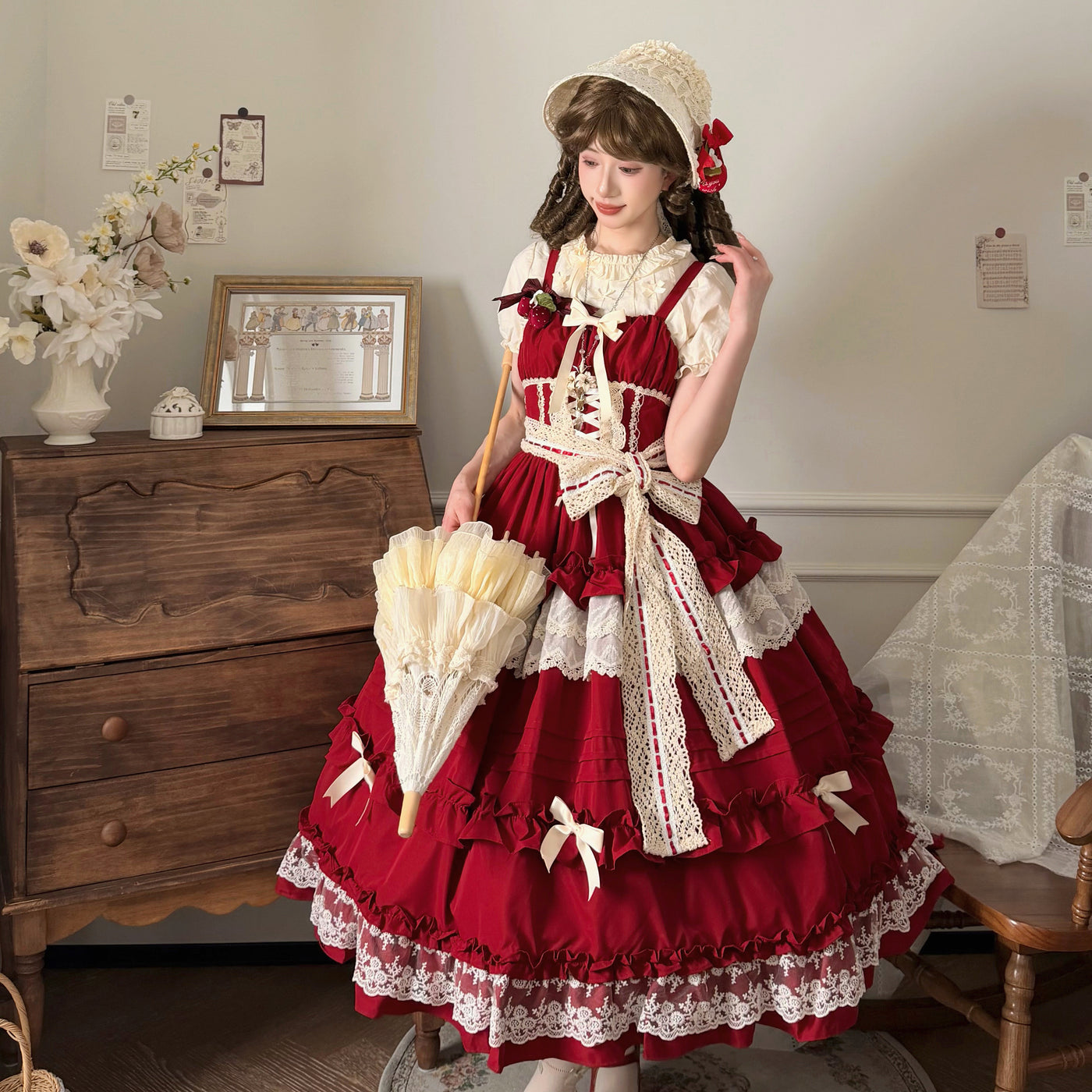 Classical Lolita JSK in sakura pink with cream lace trim and tiered skirt