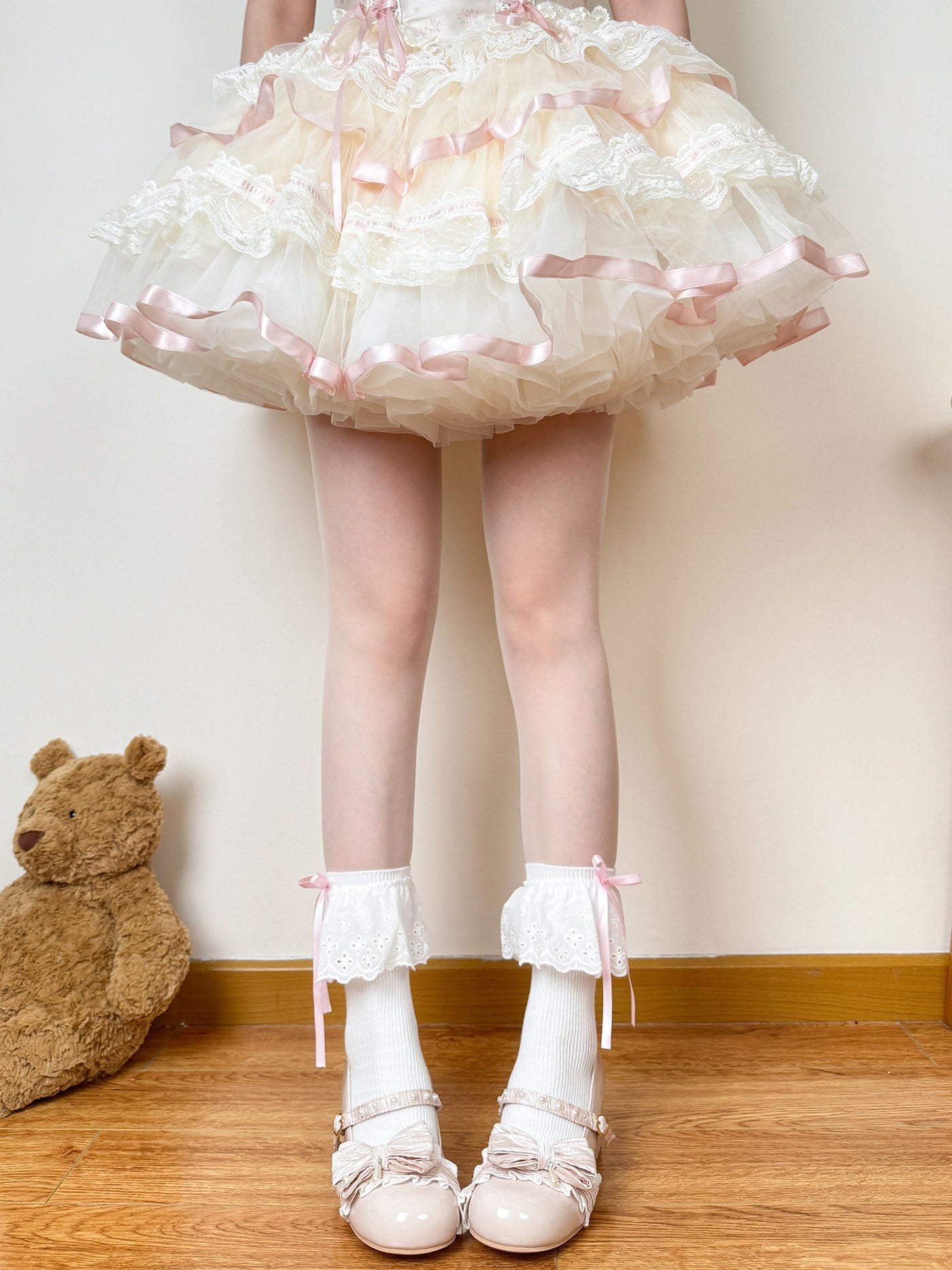 White mid-calf Lolita sock with blue bow and lace trim