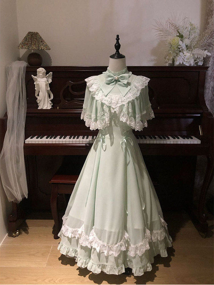Tiered skirt with scalloped lace hem and waist ribbon ties on the mint green Lolita one-piece