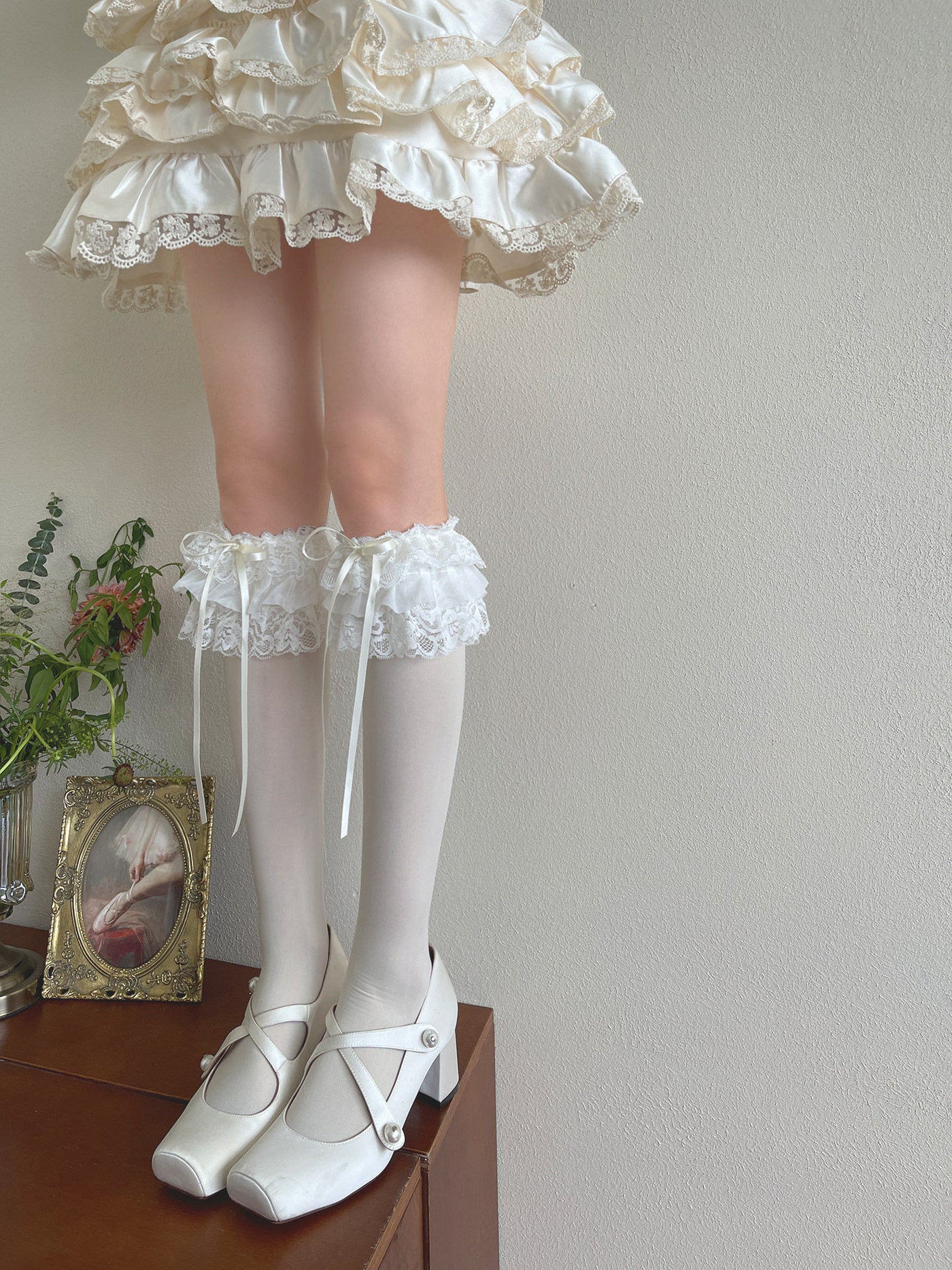 Black long-calf Sweet Lolita sock with layered ruffle cuff