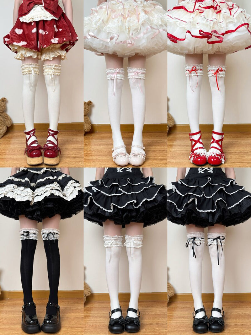 Black over-the-knee socks with black ribbon and lace trim