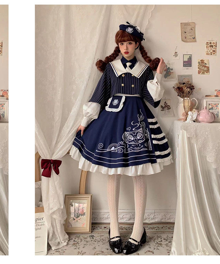 Navy and white sailor Lolita one-piece dress with gold-tone buttons and tiered skirt