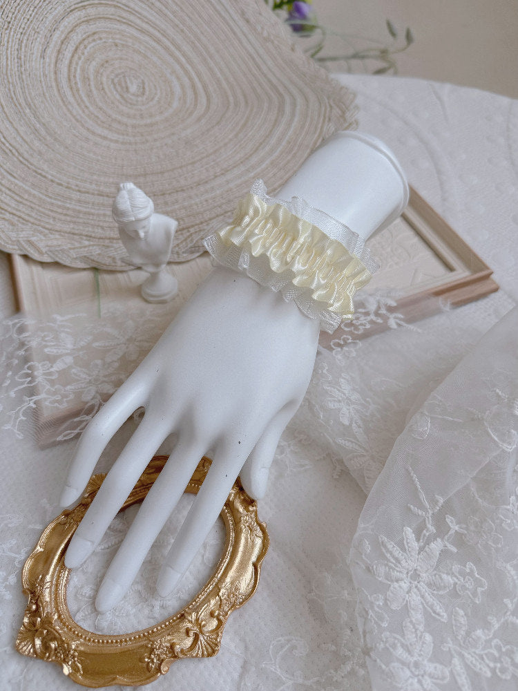 Blue satin ribbon bracelet with lace trim detail