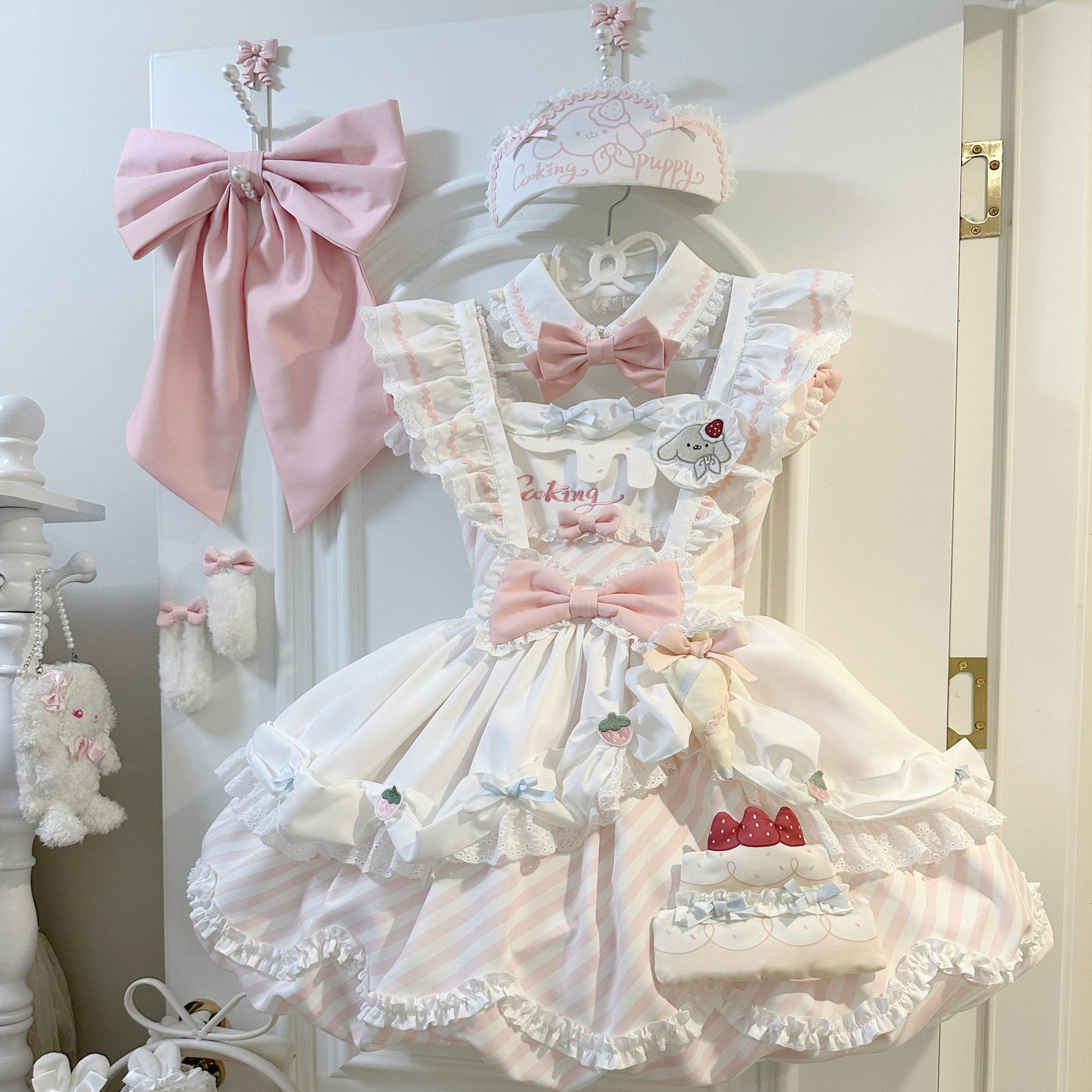 Pink Sweetheart Cake Lolita OP dress with Peter Pan collar, ruffled short sleeves, and tiered skirt with strawberry accents