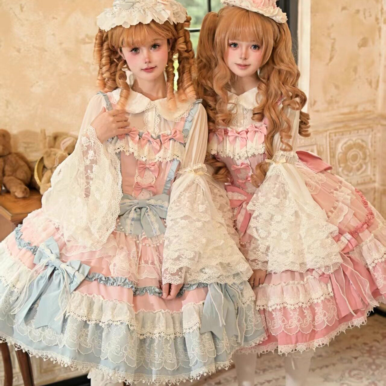 Pink tiered lace JSK worn with a large lace umbrella.