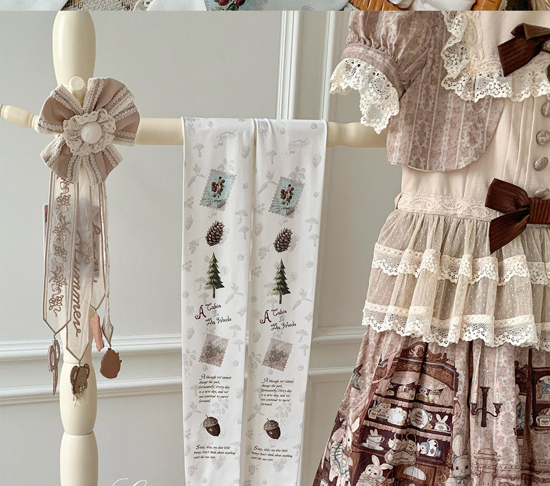Forest Cabin printed tights with woodland motifs