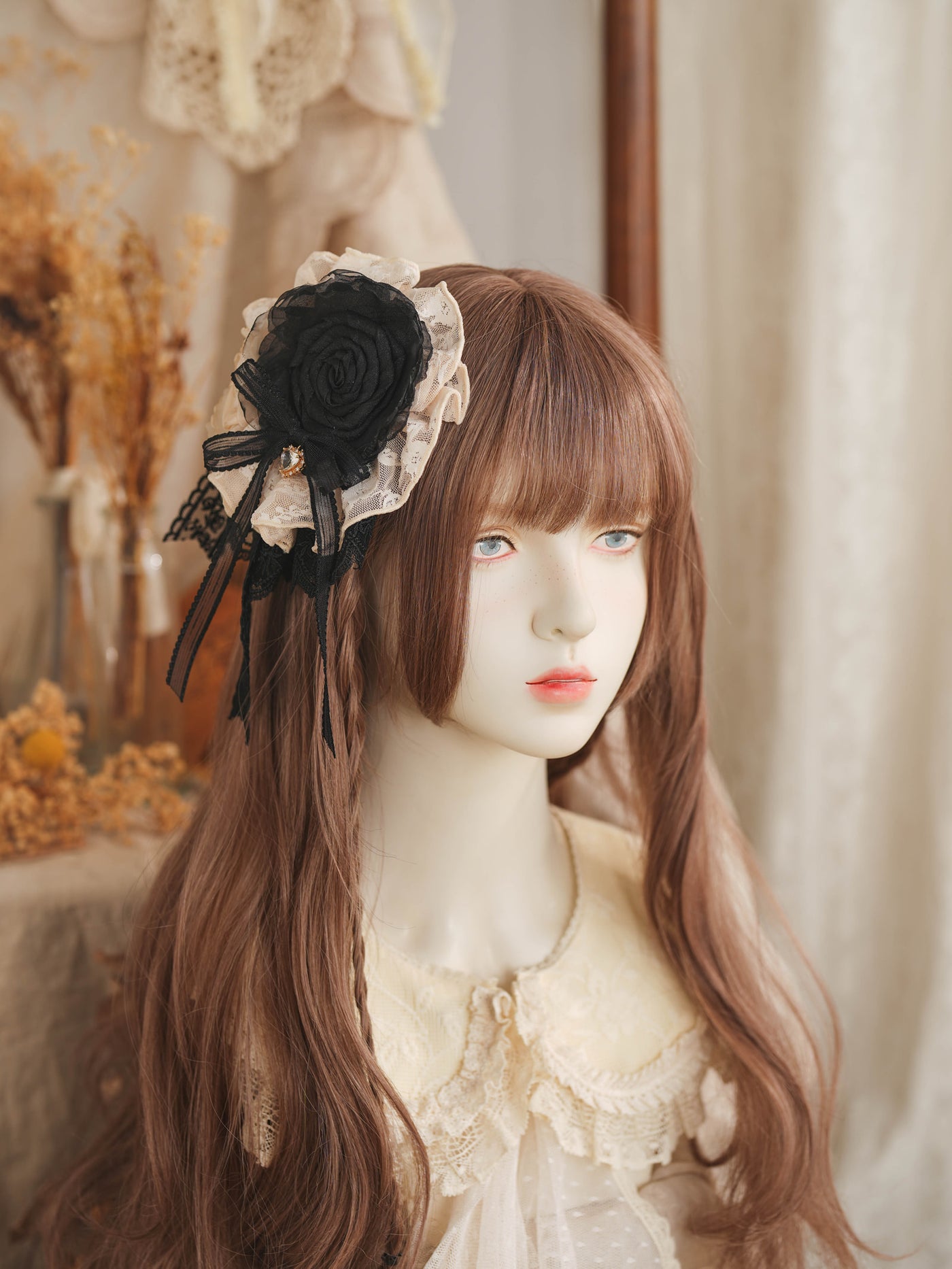 Rose-and-lace floral hair accessories with bow accents in black, purple and withered pink