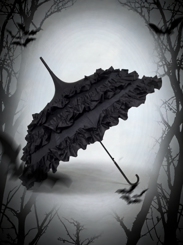 Black Gothic tiered pagoda Lolita parasol in a misty forest