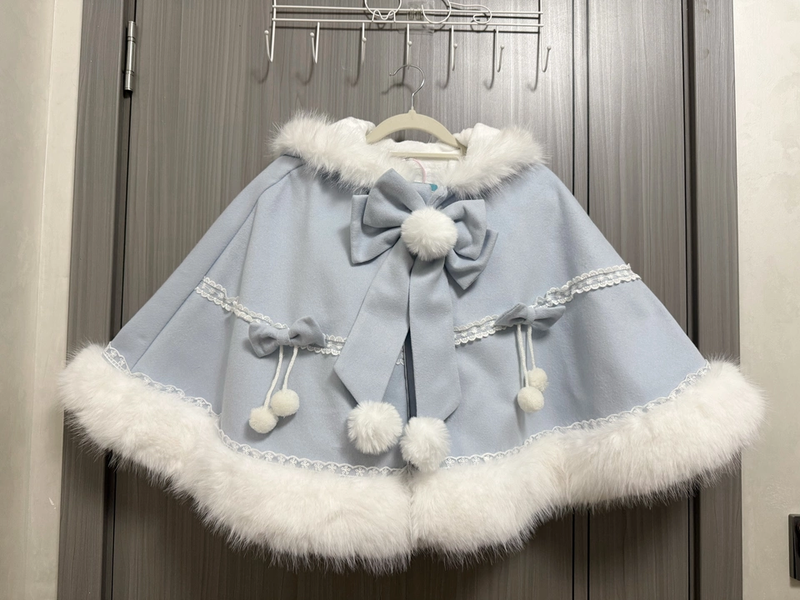 Pompom Bunny Lolita cape in blue, user-provided real product front photo with plush trim and pompom details.