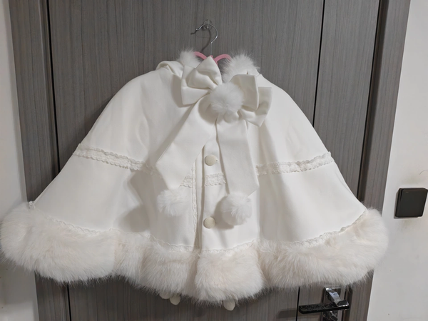 Pompom Bunny Lolita cape in white, user-provided real product front photo with plush trim and pompom details.