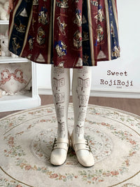 RojiRoji - The Book of Magic Rabbits - Velvet Tights with Repeating Book Motifs - Generated-color socks, brown print