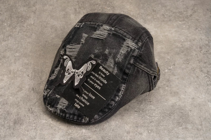 Black and Grey Distressed Denim Butterfly Flat Cap by Strange Sugar - product view 6