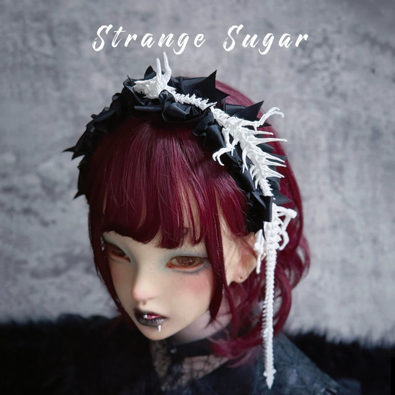 White Dragon Skeleton Bow Headband by Strange Sugar - product view 6